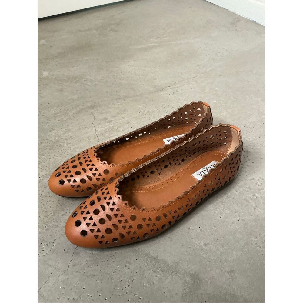 Alaia Laser Cut Ballet Flats | Brown in 38